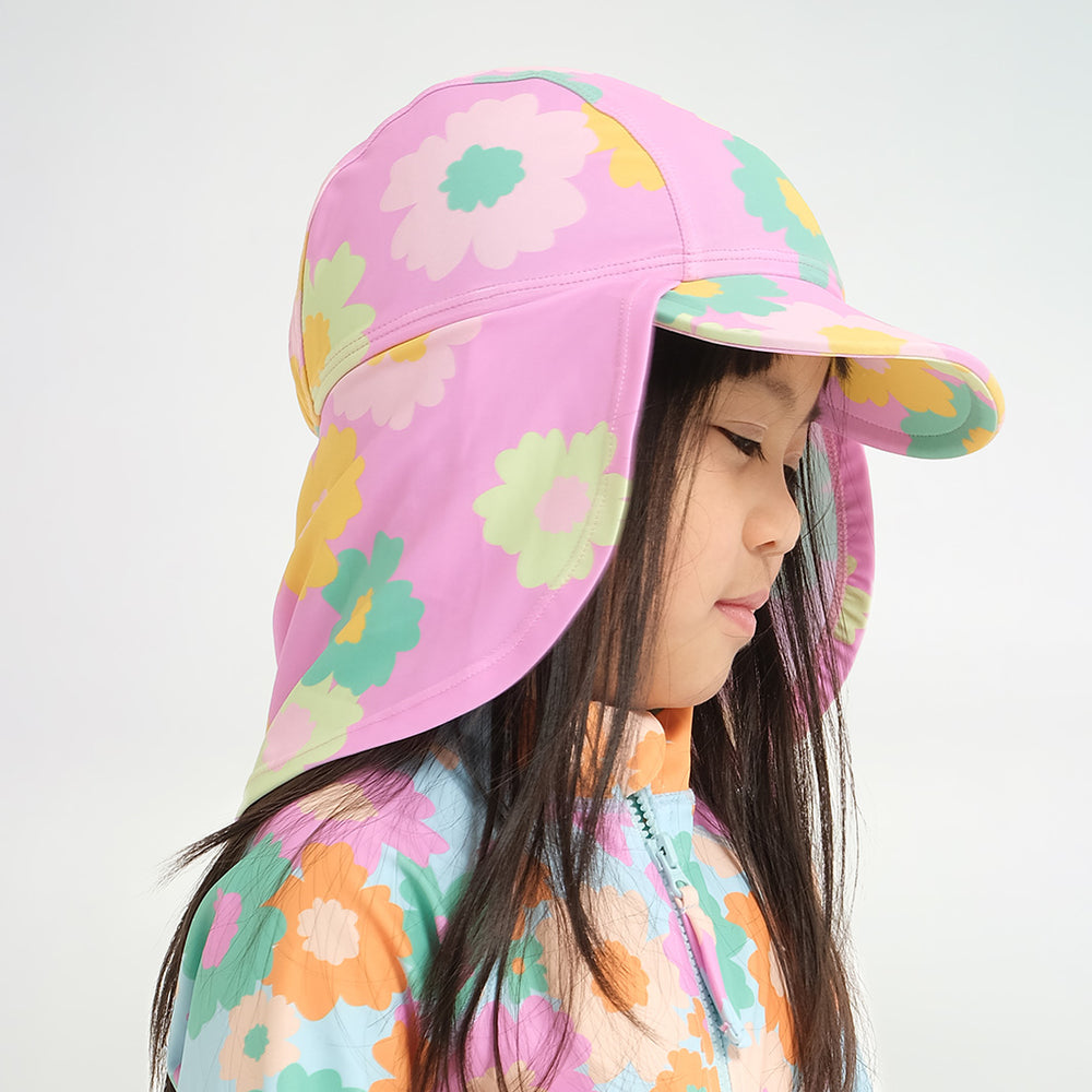 Cancer Council | Infant 60s Floral Legionnaire Swim Hat - Lifestyle Angle | Multi-Colour | UPF50+ Protection