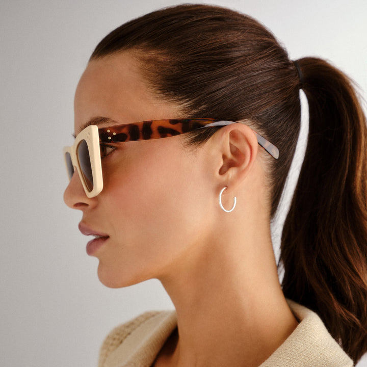 Cancer Council | Magenta Sunglasses - Angle Lifestyle | Ivory Tort